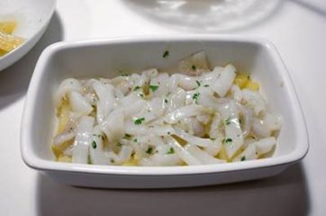 Calamari e patate al forno 8